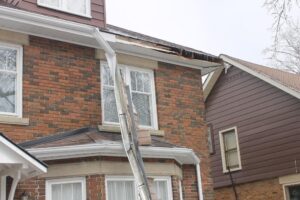 Damaged eaves from a failed Noway Maple branch in the 2016 ice storm.